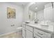 This is a cozy bathroom with a white vanity, a framed mirror and plenty of storage at 8364 Acadia Pkwy, Sherrills Ford, NC 28673