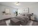 This serene bedroom includes stylish furniture, neutral tones, and comfortable decor at 8364 Acadia Pkwy, Sherrills Ford, NC 28673