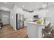 Well-designed kitchen featuring stainless steel appliances, a center island with seating, and ample counter space at 8364 Acadia Pkwy, Sherrills Ford, NC 28673