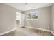 Bright bedroom with wood-look floors and walk-in closet at 9001 Vicksburg Rd, Charlotte, NC 28227