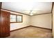 Simple bedroom featuring neutral carpet, white walls, trim and a ceiling fan at 206 Swaim Ct, Salisbury, NC 28147