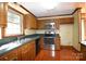 Traditional kitchen with wood cabinetry, modern appliances, and plenty of counter space at 206 Swaim Ct, Salisbury, NC 28147