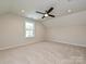 Bedroom with a ceiling fan, single window, and neutral wall color at 2387 Trundle Dr # Cwo0155, Gastonia, NC 28054
