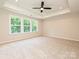 Spacious bedroom with a ceiling fan and large windows offering natural light at 2387 Trundle Dr # Cwo0155, Gastonia, NC 28054