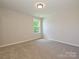 Inviting bedroom with a single window and neutral wall color at 2387 Trundle Dr # Cwo0155, Gastonia, NC 28054