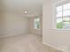 Cozy bedroom with ample natural light from two windows at 2387 Trundle Dr # Cwo0155, Gastonia, NC 28054