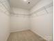 Walk-in closet with metal shelving offering ample storage space at 2387 Trundle Dr # Cwo0155, Gastonia, NC 28054