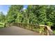 Spacious wooden deck overlooking lush greenery, perfect for outdoor entertaining and relaxation at 2387 Trundle Dr # Cwo0155, Gastonia, NC 28054