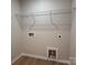 Bright Laundry room features convenient shelving and utility hookups at 2387 Trundle Dr # Cwo0155, Gastonia, NC 28054