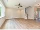 Living room featuring hardwood floors, natural light, and a staircase at 2387 Trundle Dr # Cwo0155, Gastonia, NC 28054