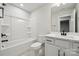 Bathroom with white vanity, tub, and shower at 3118 Whispering Creek Dr, Indian Trail, NC 28079