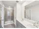 Double vanity bathroom with a large shower and mirror at 115 Ciara Pl # C, Mooresville, NC 28117