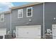 Exterior view of the home with double garage at 115 Ciara Pl # C, Mooresville, NC 28117