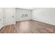 Bright and airy living room with wood-look flooring at 115 Ciara Pl # C, Mooresville, NC 28117