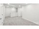 Bright loft bedroom with gray carpet and storage at 115 Ciara Pl # C, Mooresville, NC 28117