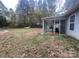 Large backyard with screened porch and hammock at 136 Creek Branch Dr, Mooresville, NC 28115