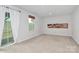 Spacious finished basement room with sliding glass door at 2608 Grantham Place Dr, Fort Mill, SC 29715