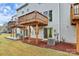 Townhouse exterior showcasing a deck and yard at 2608 Grantham Place Dr, Fort Mill, SC 29715