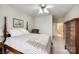 Bedroom with a striped comforter and dresser at 786 Petersburg Dr, Fort Mill, SC 29708