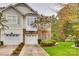 Two-story townhome with attached two-car garage and landscaped front yard at 786 Petersburg Dr, Fort Mill, SC 29708