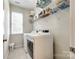 Laundry room with washer, dryer and shelving at 786 Petersburg Dr, Fort Mill, SC 29708