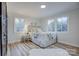 Charming bedroom with ample natural light and a window seat at 1033 Dooley Dr, Charlotte, NC 28227