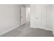 Well-lit bedroom featuring grey carpet and doors at 115 Ciara Pl # A, Mooresville, NC 28117