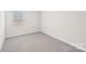 Bright bedroom with grey carpet and neutral walls at 115 Ciara Pl # A, Mooresville, NC 28117