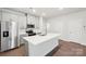 Modern kitchen with gray cabinets and stainless steel appliances at 115 Ciara Pl # A, Mooresville, NC 28117