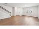 Spacious living room with hardwood floors and large windows at 115 Ciara Pl # A, Mooresville, NC 28117