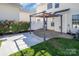 Spacious backyard with a patio and a pergola, perfect for outdoor living at 18023 Train Station Dr, Cornelius, NC 28031
