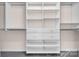 Custom closet shelving offering ample storage with adjustable shelves and drawers at 18023 Train Station Dr, Cornelius, NC 28031