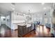Modern kitchen featuring stainless steel appliances and a central island with barstool seating at 20361 Enclave Oaks Ct, Cornelius, NC 28031