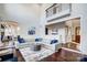 Open-concept living room with hardwood floors and stylish furniture at 20361 Enclave Oaks Ct, Cornelius, NC 28031