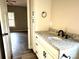 Bathroom with white vanity, granite countertop, and black fixtures at 1162 Scenic Cir, Shelby, NC 28150