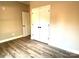 Simple bedroom with vinyl flooring and double door closet at 1162 Scenic Cir, Shelby, NC 28150