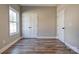 Neutral bedroom with natural light, a closet, fresh paint, and wood-look vinyl flooring at 1162 Scenic Cir, Shelby, NC 28150