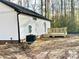 House exterior showcasing a deck and partial view of wooded area at 1162 Scenic Cir, Shelby, NC 28150