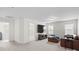 Cozy bonus room with a wall-mounted TV and plenty of seating space at 122 W Heart Pine Ln, Statesville, NC 28677