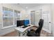 Inviting home office featuring a large window, desk, and comfortable chair at 122 W Heart Pine Ln, Statesville, NC 28677