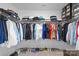 Large walk-in closet offering ample storage with organized shelving and clothing racks at 122 W Heart Pine Ln, Statesville, NC 28677