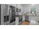 Sleek kitchen, stainless steel appliances, granite countertops and white cabinets at 278 Harpers Run Ln, Matthews, NC 28104