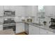 Kitchen with stainless steel appliances and white cabinets at 278 Harpers Run Ln, Matthews, NC 28104