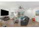 Living room with hardwood floors, fireplace, and sliding glass doors to patio at 278 Harpers Run Ln, Matthews, NC 28104