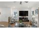 Living room with hardwood floors, fireplace, and large windows at 278 Harpers Run Ln, Matthews, NC 28104