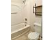 Clean bathroom with tub, shower, and shelving at 3312 Heathstead Pl, Charlotte, NC 28210