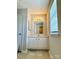 Bathroom with vanity, mirror, and a window with blinds at 3312 Heathstead Pl, Charlotte, NC 28210