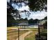 Community pool with a gazebo and surrounding trees at 3312 Heathstead Pl, Charlotte, NC 28210