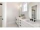 Elegant bathroom featuring double vanity and quartz countertop at 1325 Ballard Dr, Waxhaw, NC 28173