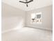 Bright bedroom with ceiling fan and carpet at 1325 Ballard Dr, Waxhaw, NC 28173